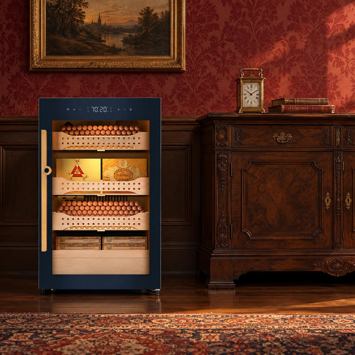 Afidano B2 glass-door cigar humidor cabinet beside an antique carved walnut sideboard in a Victorian library