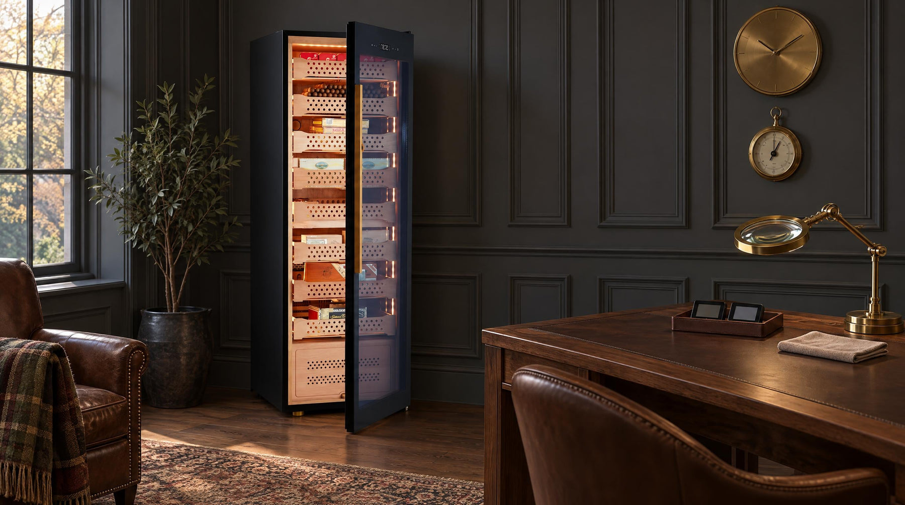 Afidano B8 cigar humidor cabinet open to its lit cedar trays, with hygrometers on a walnut desk