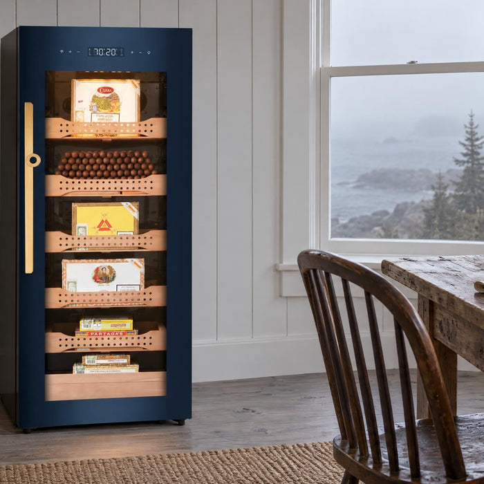 Afidano B4 glass-door cigar humidor cabinet in a white board-walled coastal study on a foggy morning