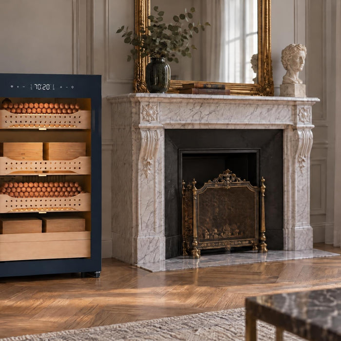 Afidano B2 glass-door cigar humidor cabinet beside a marble fireplace in an elegant Parisian study