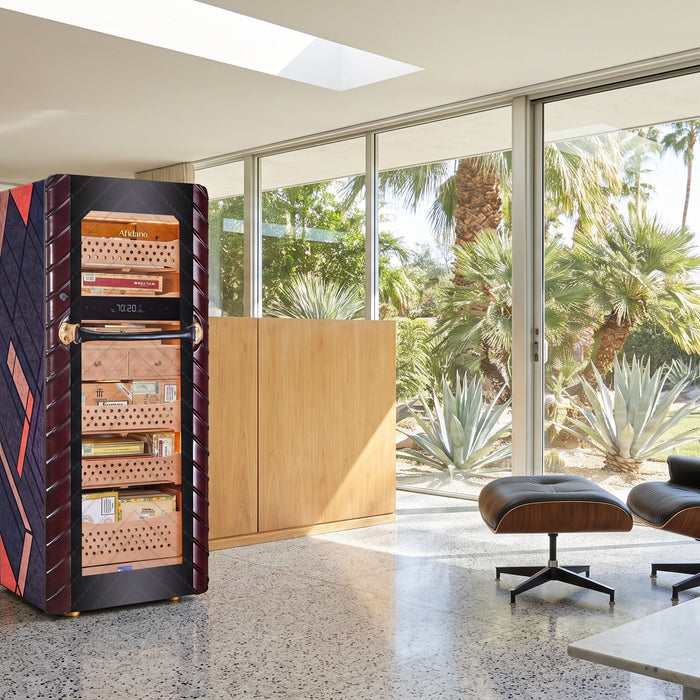 Afidano C5 Atelier cigar humidor with Art Deco marquetry side panel in a mid-century modern glass-walled living room