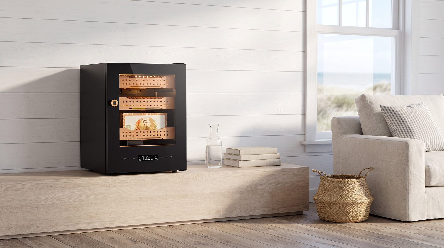 Afidano B1 compact glass-door cigar humidor displaying cedar trays on an oak console in a bright coastal living room