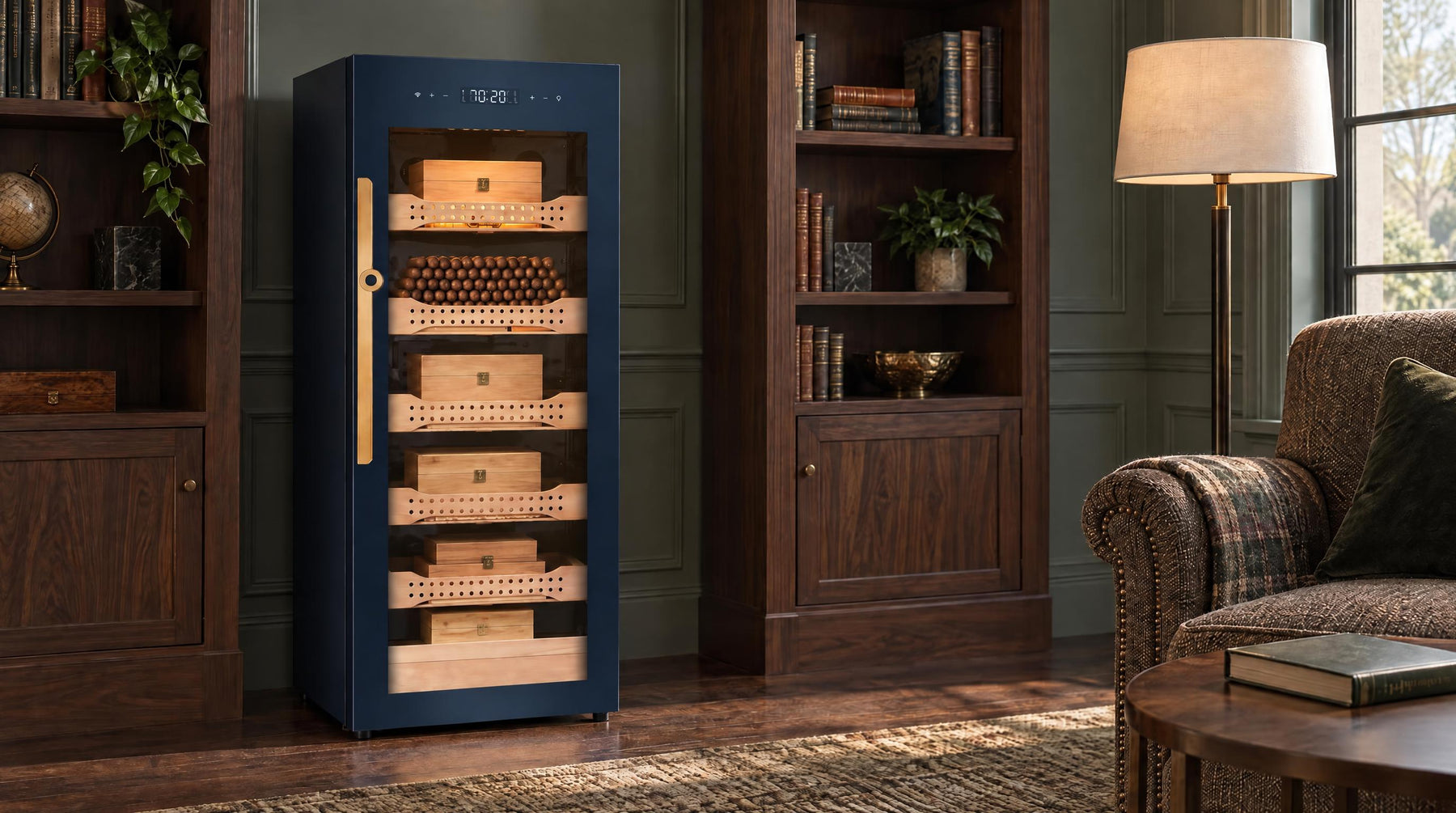 Afidano B4 glass-door cigar humidor cabinet standing free between walnut bookcases in a green-panelled den
