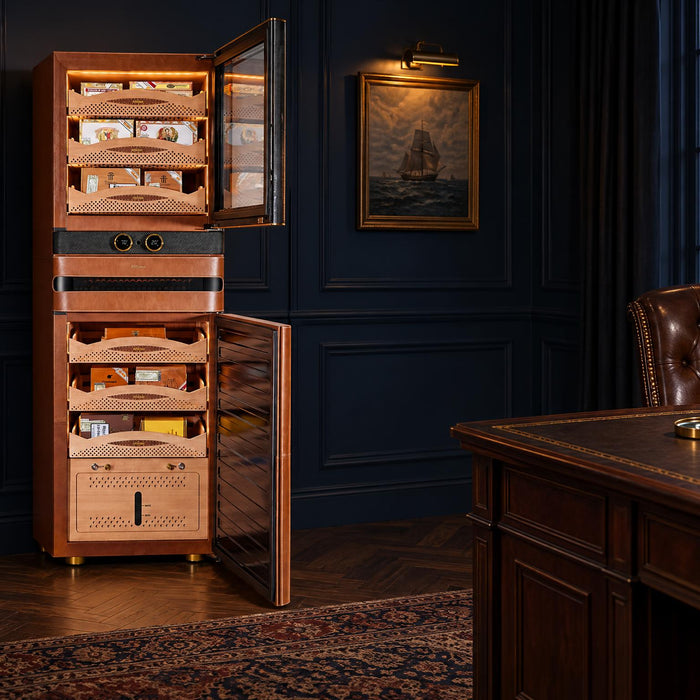 Afidano L8 leather cigar humidor with both doors open to Spanish cedar drawers in a navy-panelled study