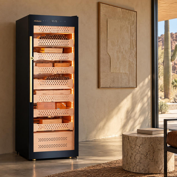 Afidano B6 compressor-cooled cigar humidor cabinet in a shaded desert-modern study with saguaro views